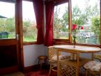 The conservatory looks out on to the patio and garden
