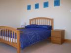 The double bedroom on the first floor has fine views over Loch Garry
