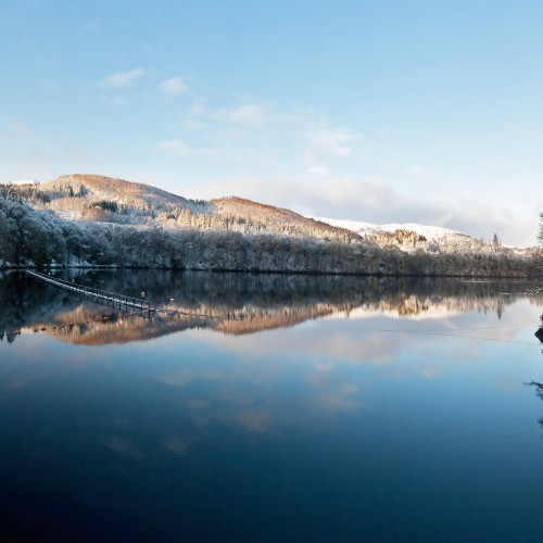 Snowy hills at Pitlochry dam.