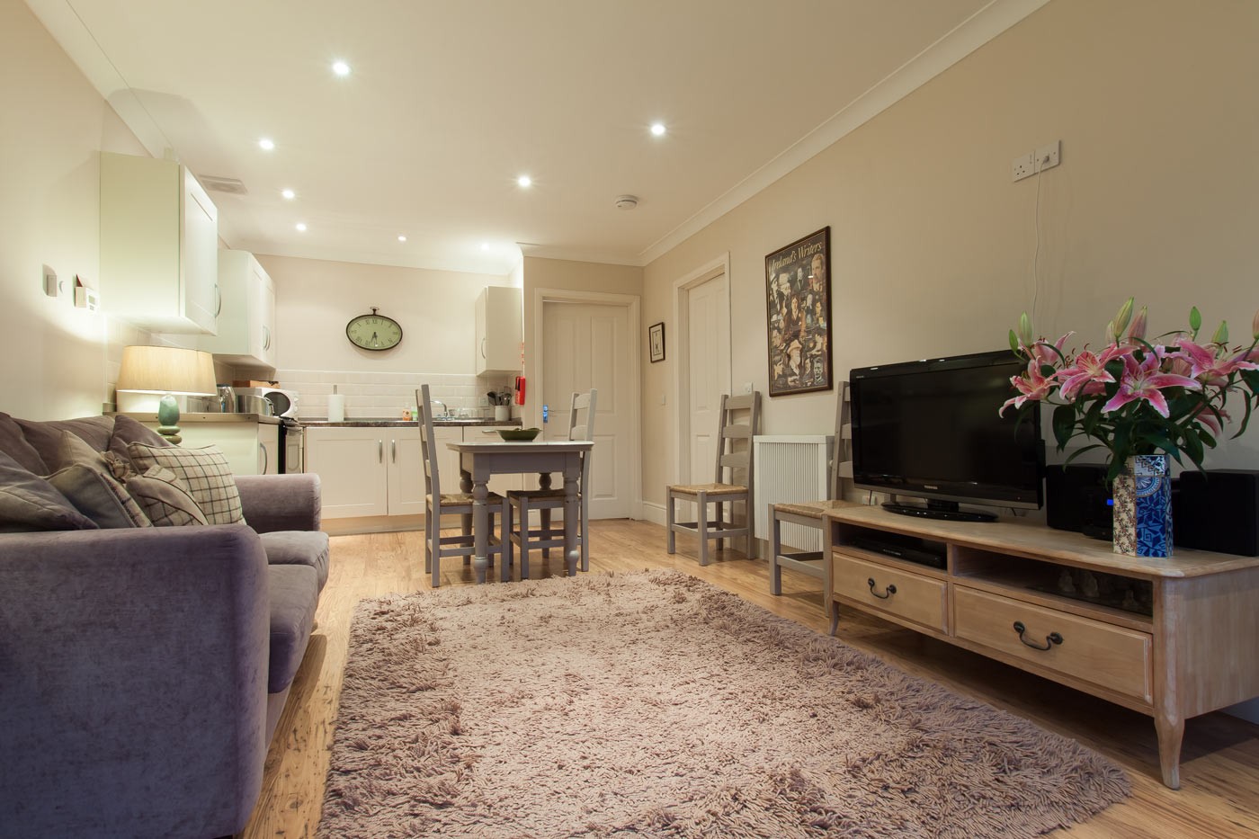 Open plan kitchen/ living/ dining room.