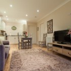 Open plan kitchen/ living/ dining room.
