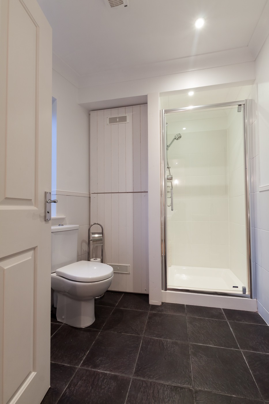 Bathroom with shower and toilet.