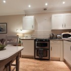 Kitchen with oven and microwave.