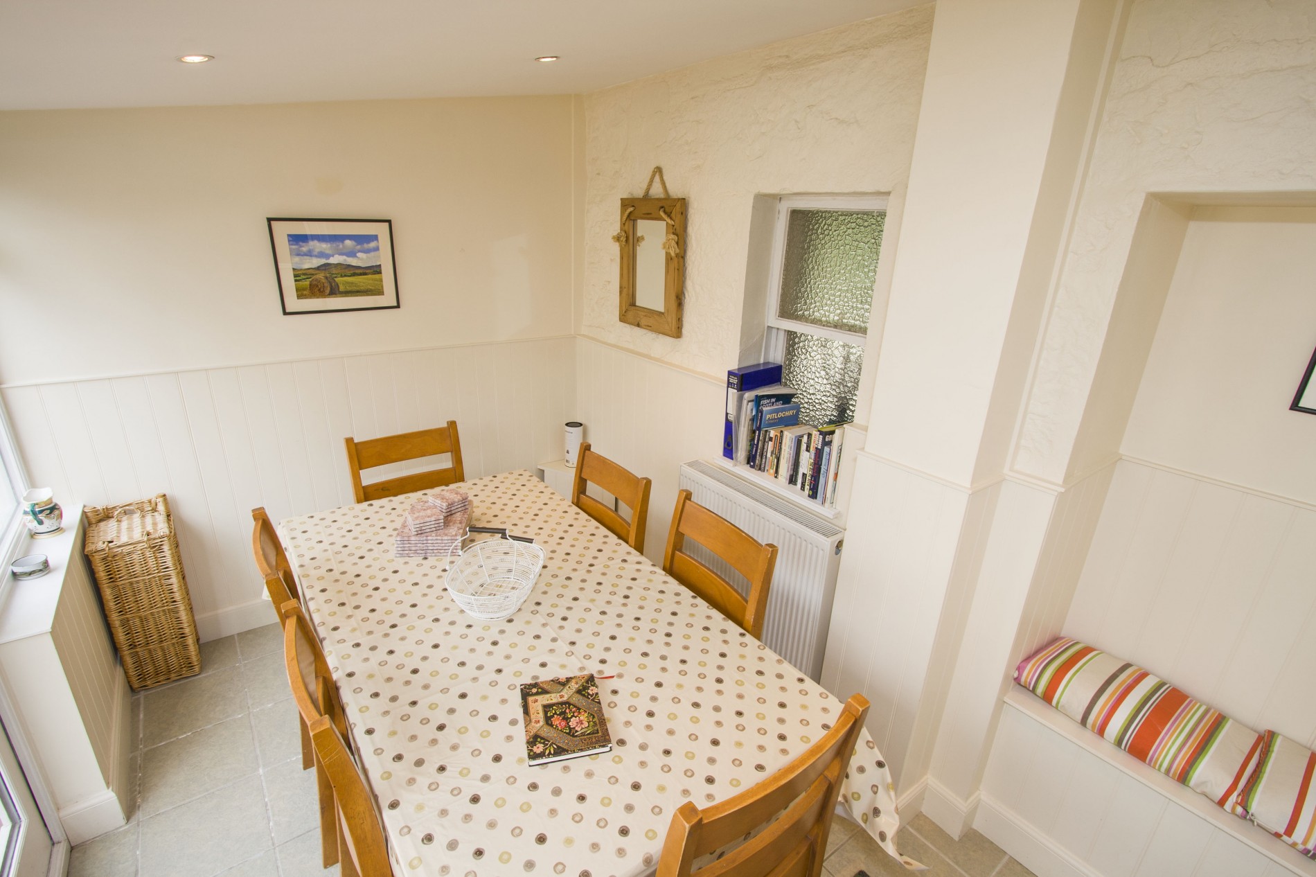 Dining room with table and 6 chairs.