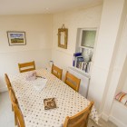 Dining room with table and 6 chairs.