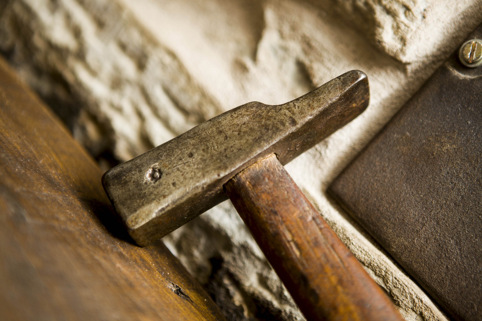 Hammer on a wooden bench.