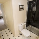 Bathroom with toilet and shower.