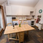 Well equipped kitchen and dining area, washing machine, microwave, dishwasher, fridge, freezer