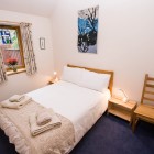 Double bedroom with ample storage, bed linen and towels provided