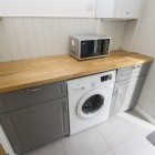 Washing machine and microwave in utility area