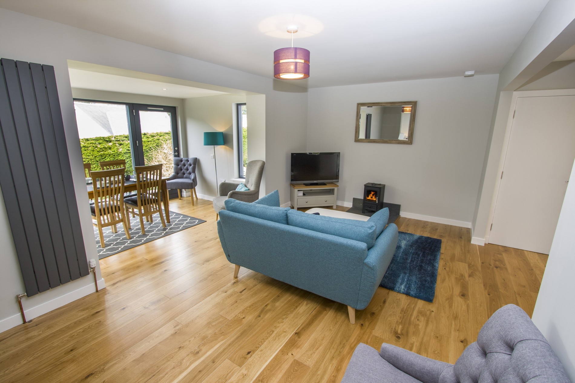 Living room also features TV with DVD and a wood burning stove ensuring guests will be cosy all year round