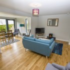 Living room also features TV with DVD and a wood burning stove ensuring guests will be cosy all year round