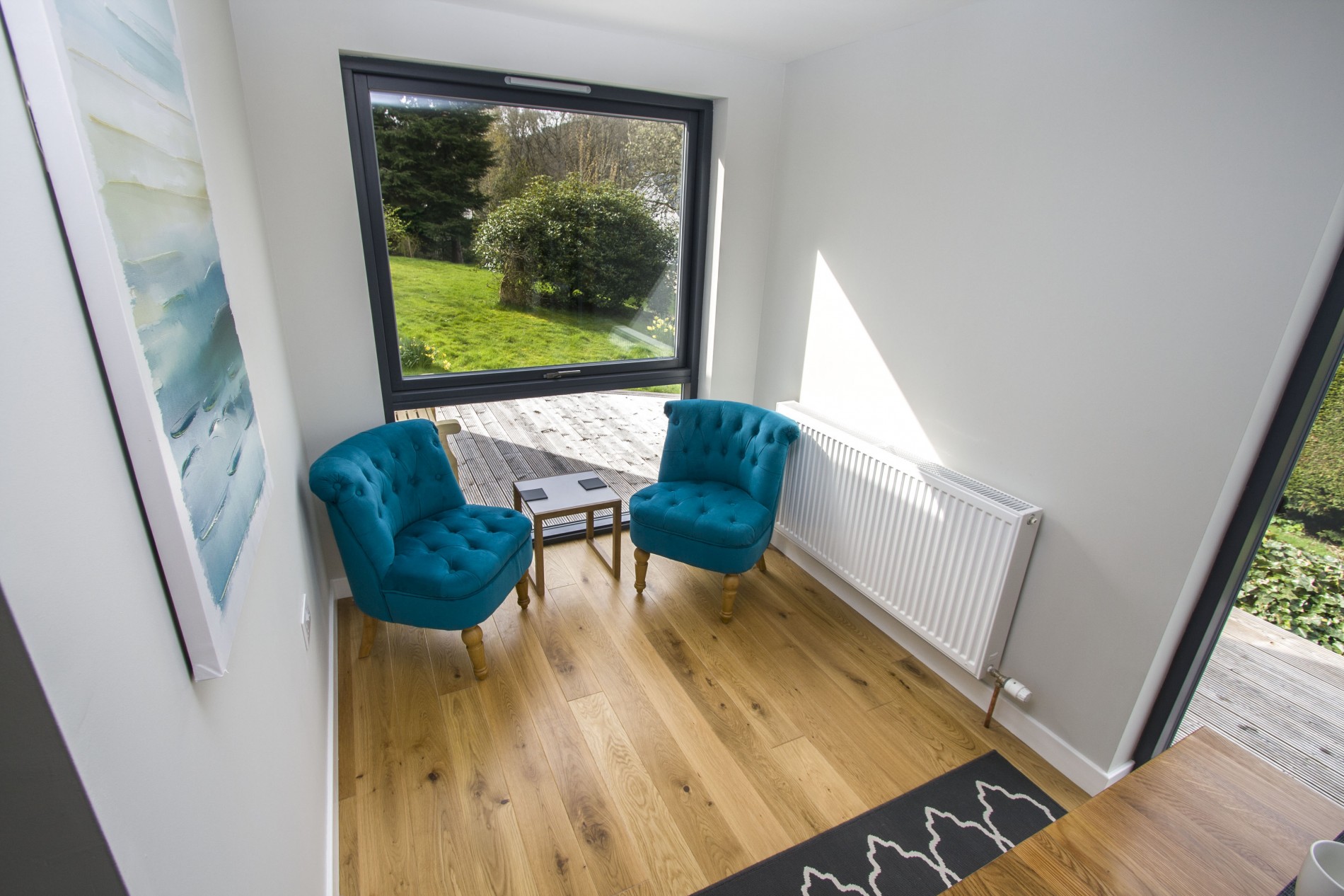 Seating area beside large window to enjoy the beautiful views