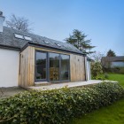 Outside Roneval features a spacious garden with decking area prefect for enjoying the sun and relaxing