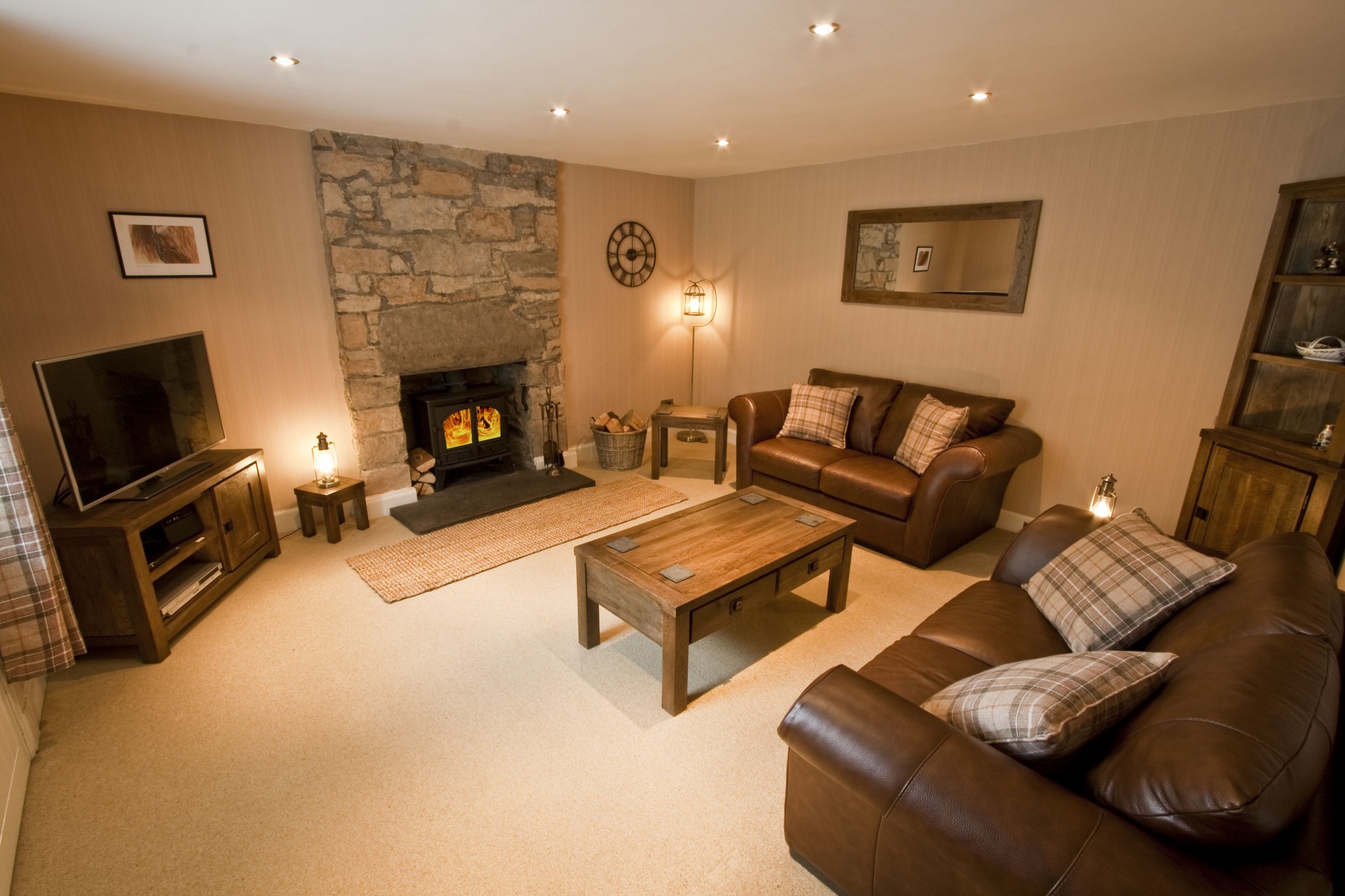 Large, comfortable living room with newly installed wood burning stove, feature stone wall and Caithness stone hearth.LED TV, DVD player and Freeview box.Hallway with under stairs cloakroom, wash hand basin and WC. Large and attractive kitchen fitted with quality oak units and granite work surfaces.