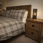 The attractive double bedroom has built in wardrobes offering excellent hanging and storage space.