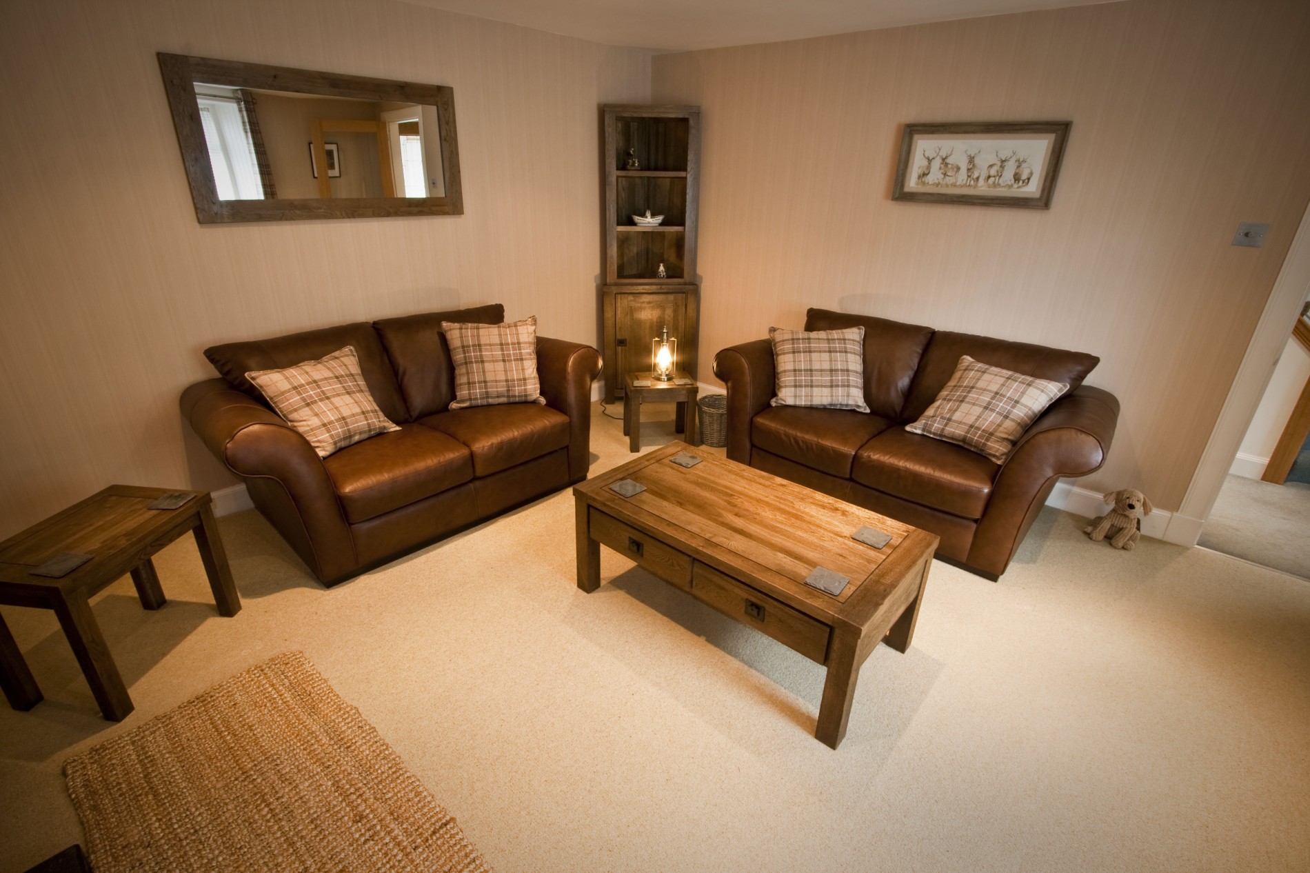 Large, comfortable living room with newly installed wood burning stove, feature stone wall and Caithness stone hearth.LED TV, DVD player and Freeview box.
