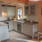 Kitchen with oven, cabinets and dishwasher