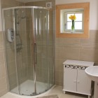 Bathroom with shower, cabinet and sink