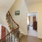 Spiral staircase looking onto bedroom