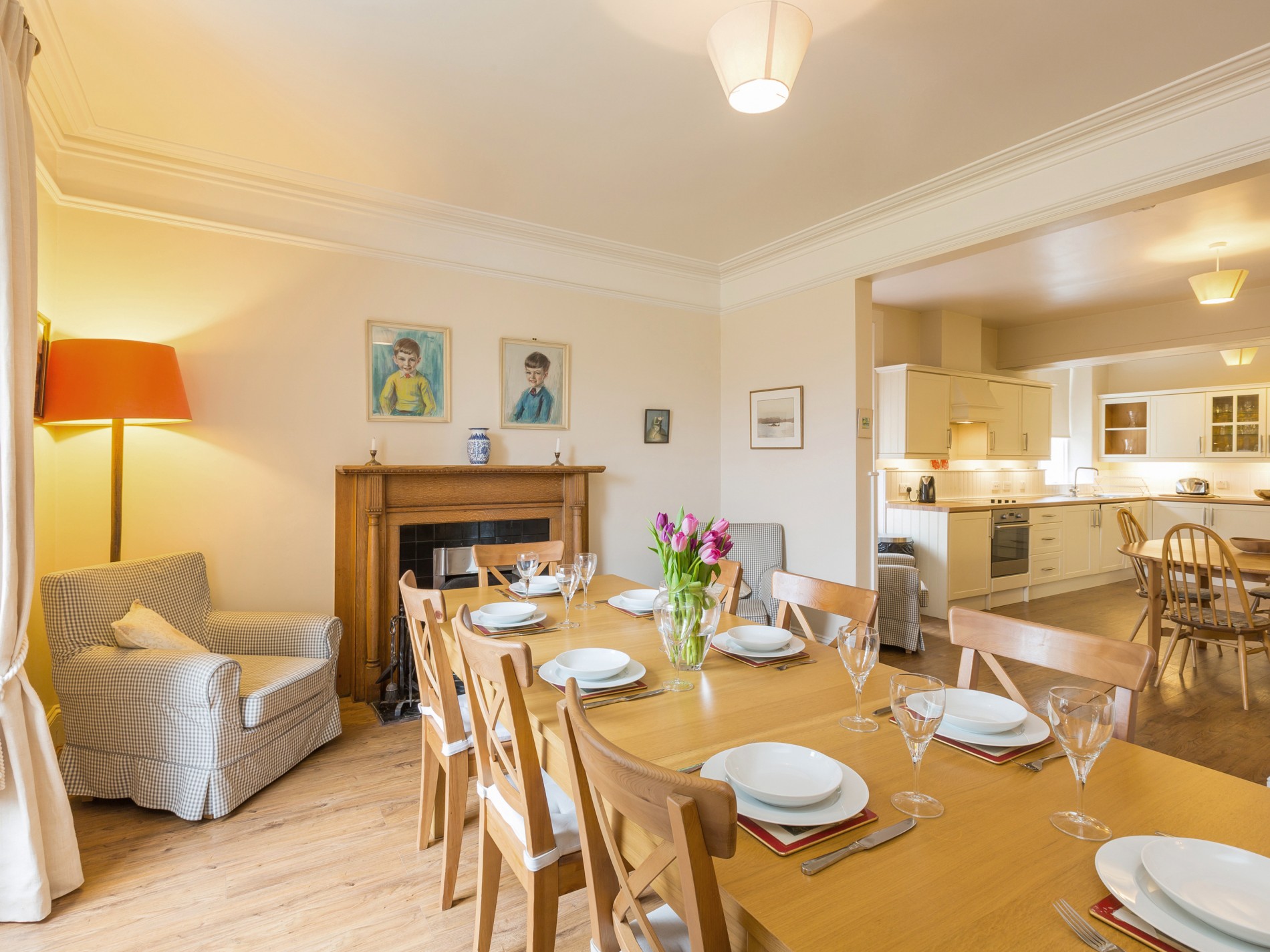 Dining Room with long dining table and fireplace